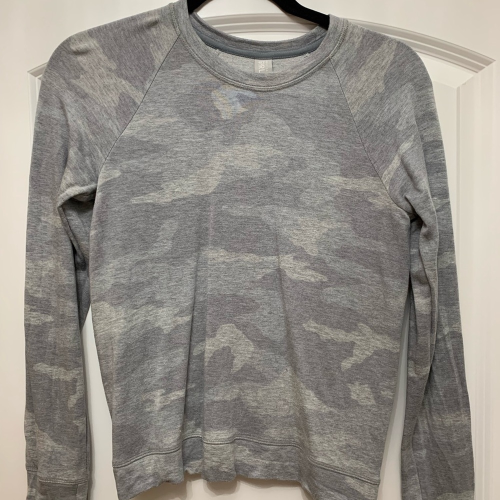 Athleta Girl. Split back sweatshirt. Good condition, no holes or stains.